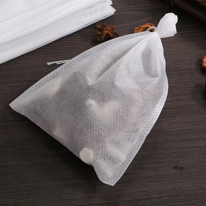 100 sachets de thé jetables en tissu non tissé avec cordon de serrage | Multi-usages : décoction médicinale, filtration du café et infusion du thé