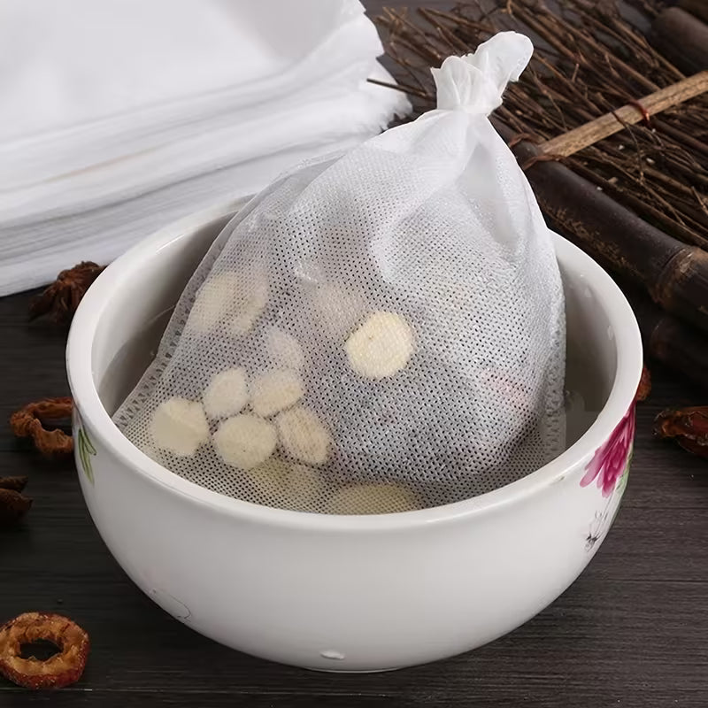 100 sachets de thé jetables en tissu non tissé avec cordon de serrage | Multi-usages : décoction médicinale, filtration du café et infusion du thé