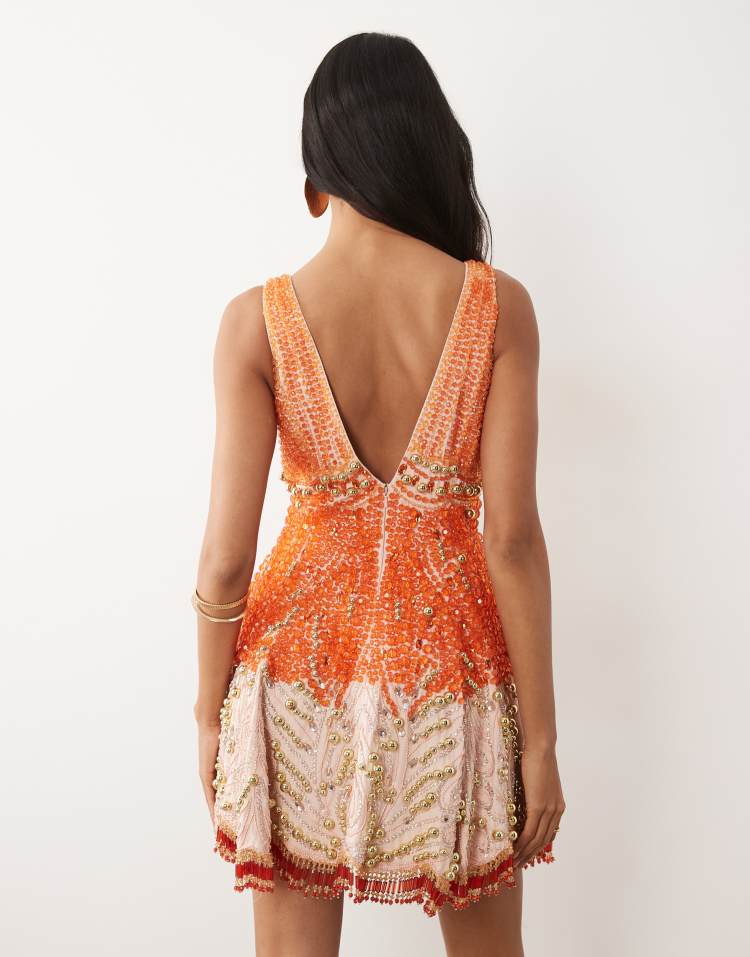 Verziertes Minikleid mit Korsett-Einsätzen